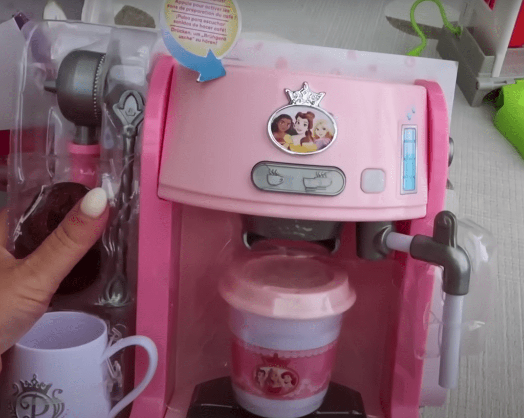 Disney Style Collection Espresso Machine – A stylish pink and gold toy coffee maker designed for kids who love imaginative play, inspired by Disney princess aesthetics.