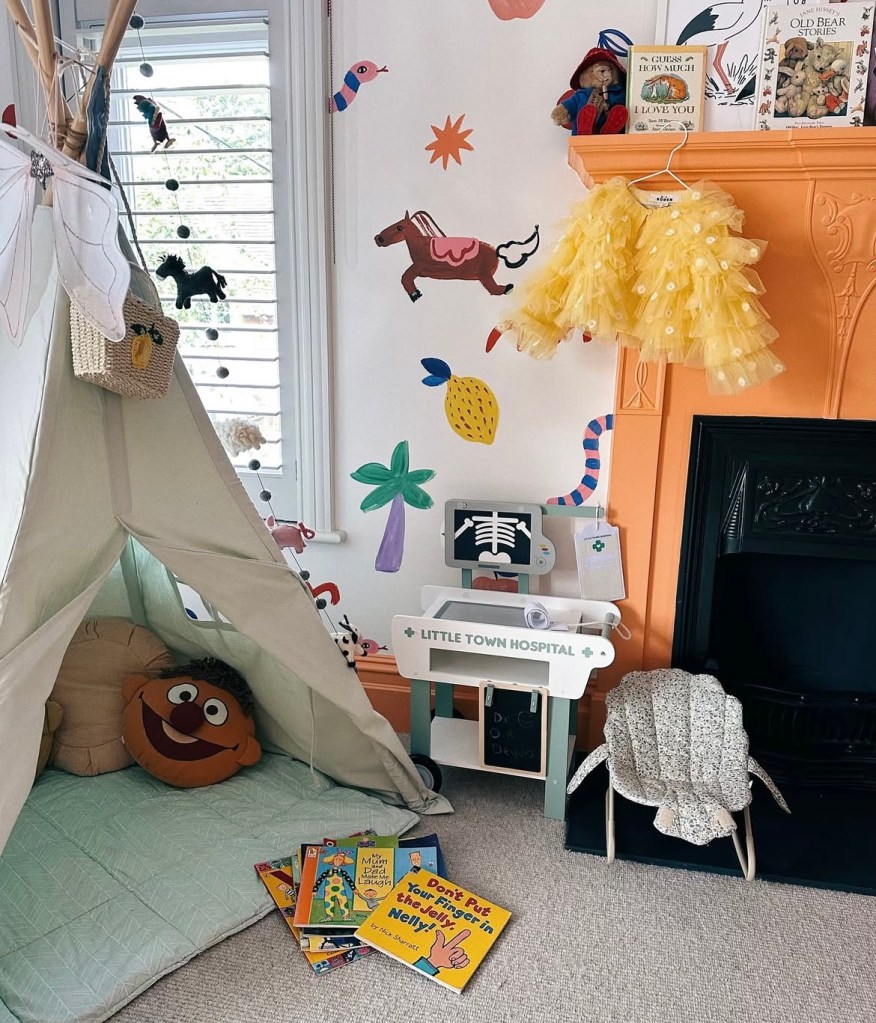 Cozy reading nook featuring a whimsical tent, soft cushions, and a beautifully arranged book corner, creating an inviting space for kids to relax and explore their imagination.