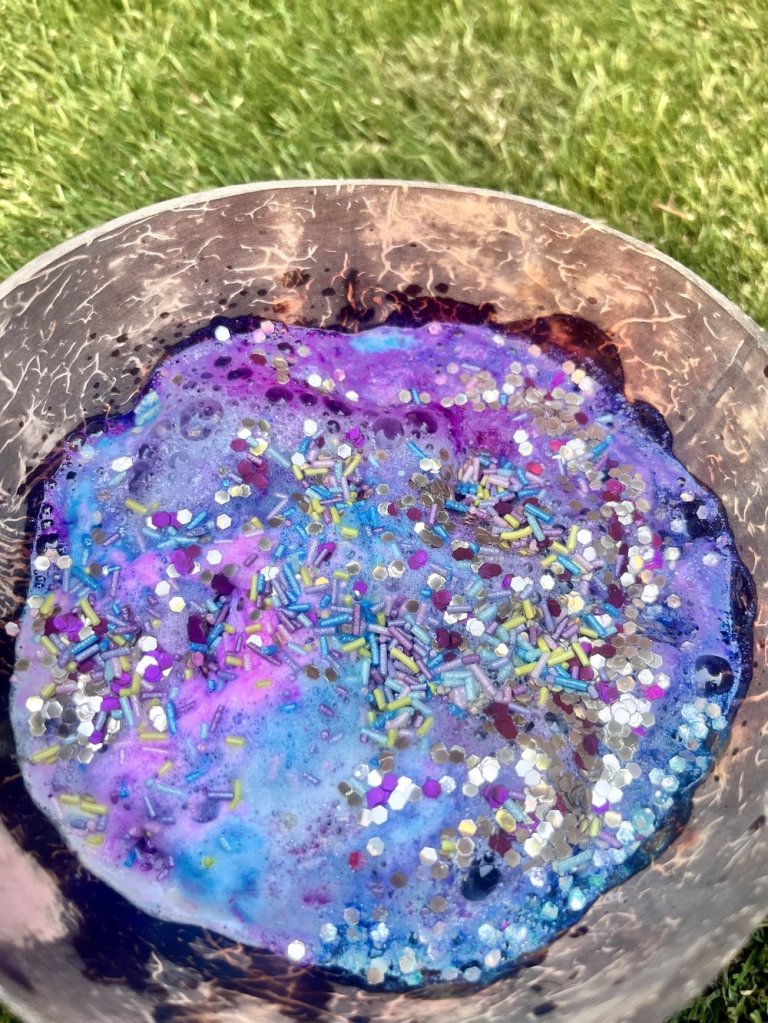 A bowl of colorful, fizzing potion created using the Princess Potion Kit.