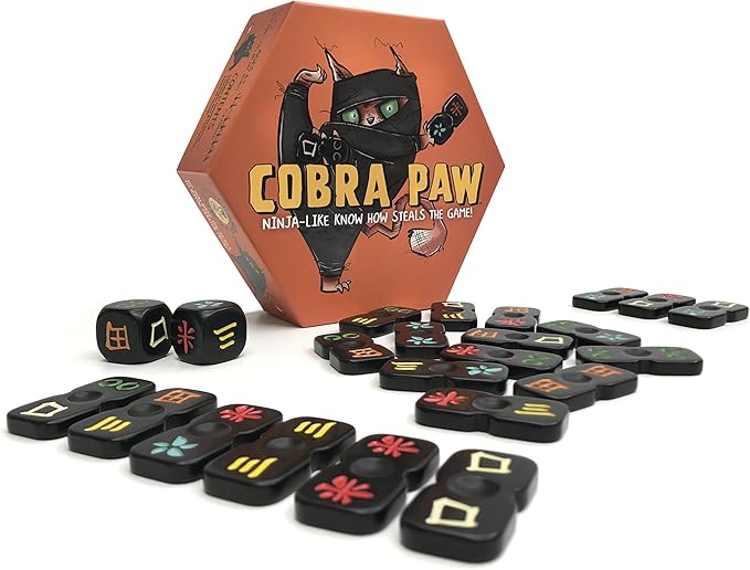 Cobra Paw tiles and dice set up for a round of play.