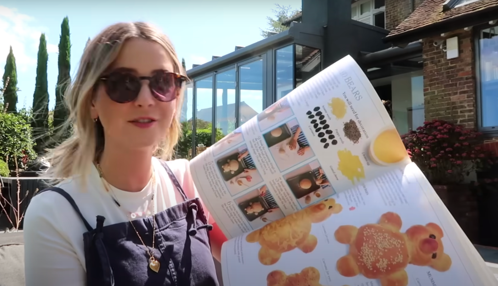 Zoe Sugg shows a childhood cookbook with step-by-step illustrated recipes.
